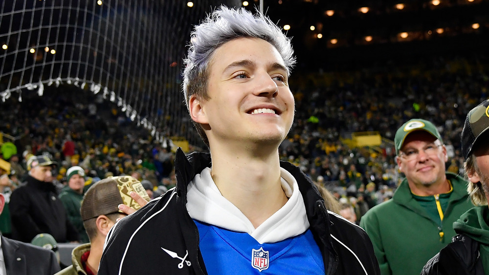 Ninja hangs out in a Packers game crowd
