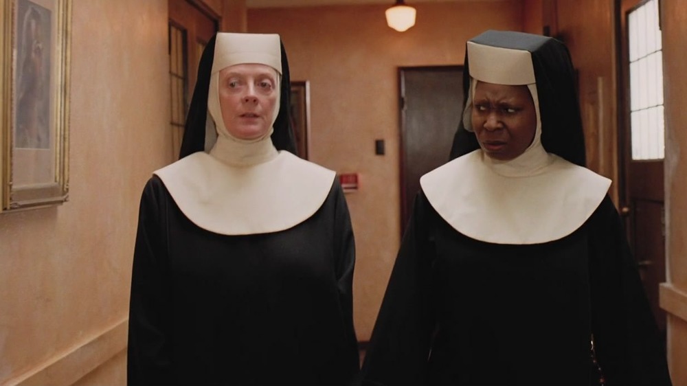 Nuns walking down hall