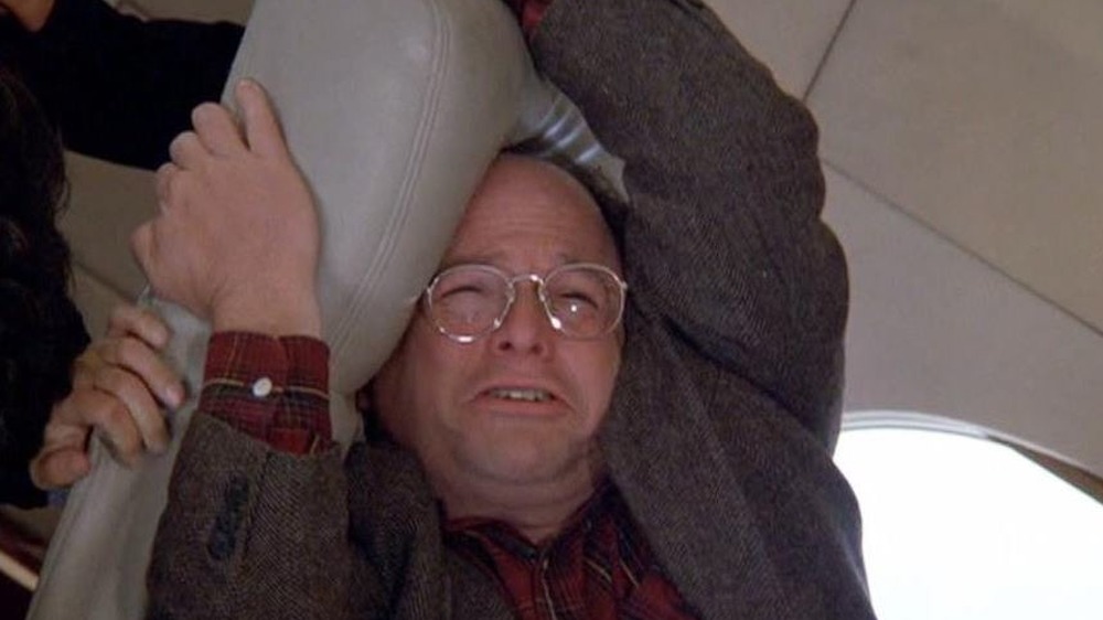 George Costanza hanging on